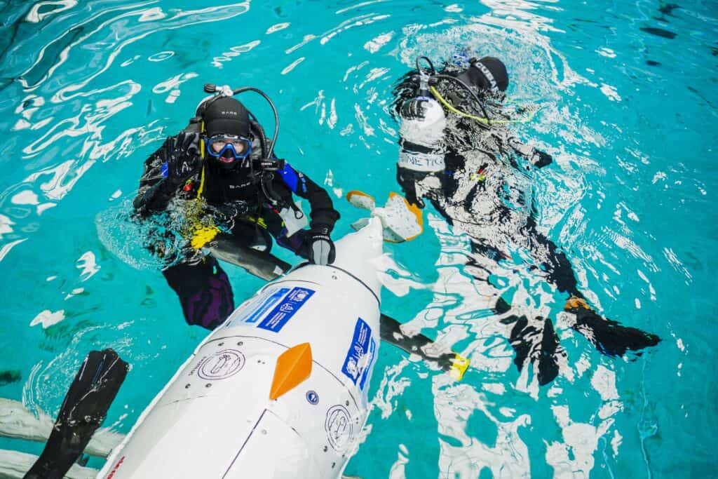 Student Engineers Race Human-Powered Submarines at Historic Ocean Basin